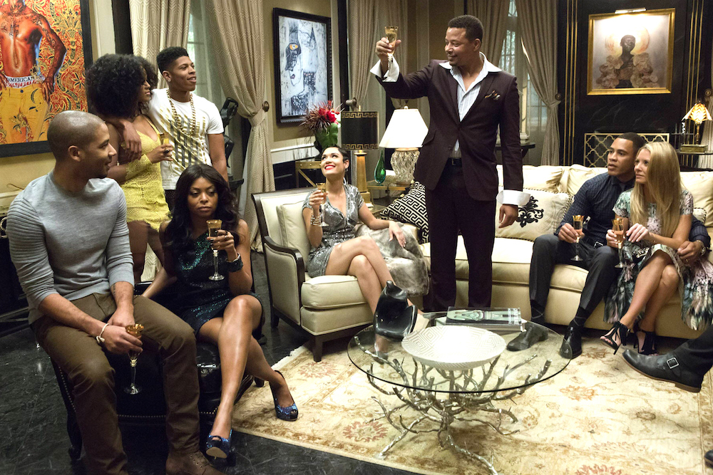 EMPIRE: Lucious (Terrence Howard) toasts his family in the "Devil Quotes Scripture" episode airing Wednesday, Jan. 21 (9:00-10:00 PM ET/PT) on FOX. Pictured L-R: Jussie Smollett, Serayah McNeill, Taraji P. Henson, Bryshere Gray, Grace Gealey, Terrence Howard, Trai Byers and Kaitlin Doubleday. ¨©2014 Fox Broadcasting Co. CR: Chuck Hodes/FOX