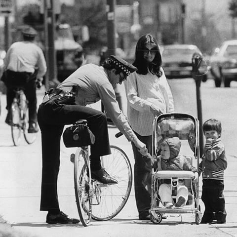 Chicago Police officer Robert Rice greets neighbors on the beat in May 1981. Photo by Val Mazzenga 