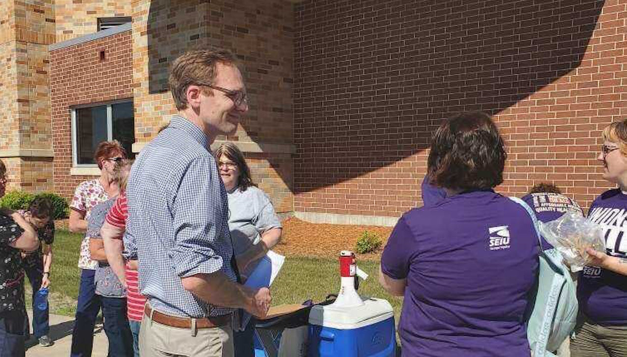 Senate Candidate Tom Nelson rallies with Wisconsin Rapids health care workers on June 16, 2021.